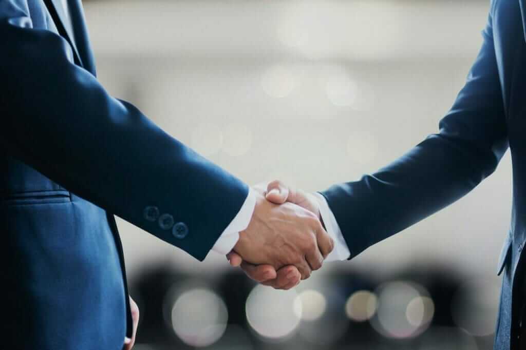 two business man shaking hands