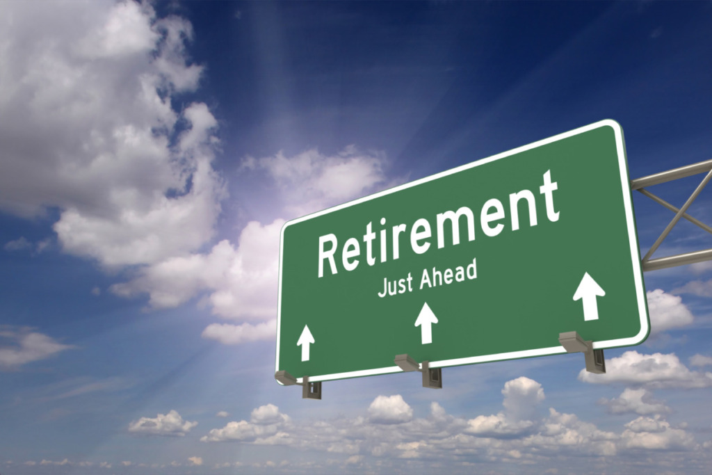 A picture of a sign board with written retirement on it.