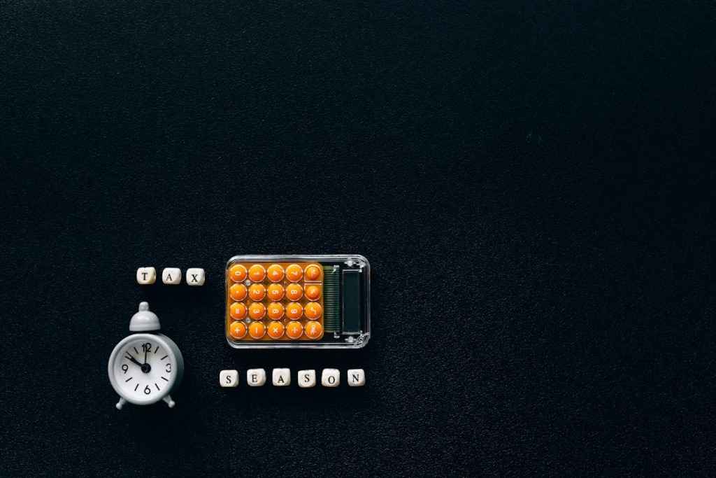 an alarm clock, a calculator and dices