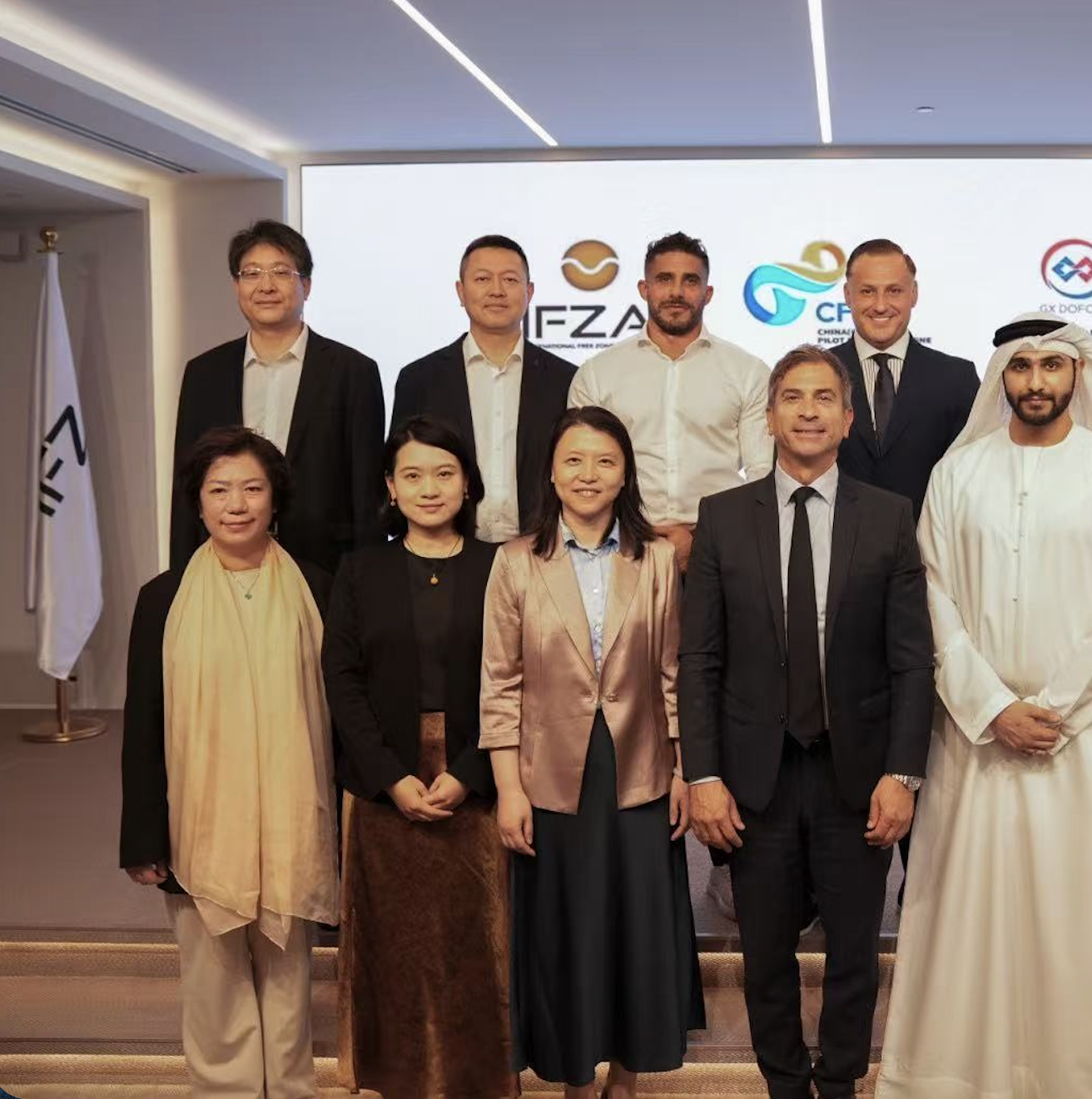 Group photo with the IFZA, CFTZ and GX DOFCOM delegation after signing